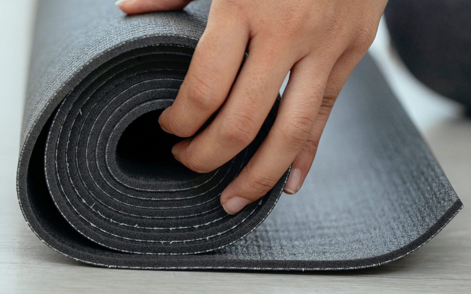 unrolling yoga mat